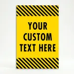 Custom text hazard stripe A-frame sign with yellow panel and black diagonal stripes in white frame for Los Angeles business or construction site