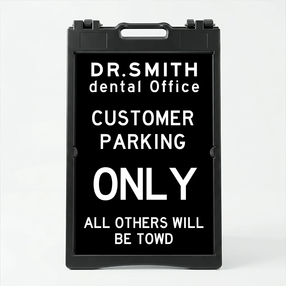 Custom tow warning parking enforcement A-frame sign with black background and white text for Los Angeles retail store apartment or office building
