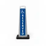 Blue and white handicap accessible reserved parking flat cone sign with wheelchair symbol and vertical RESERVED lettering for Los Angeles medical facility office building or parking lot