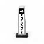 Black and white entrance flat cone sign with white right arrow on black header and vertical ENTRANCE lettering on white background for Los Angeles office building medical facility or event venue