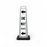 Black and white one way traffic flat cone sign with dual left pointing arrows above and below ONE WAY TRAFFIC lettering on white background for Los Angeles parking lot garage or private road