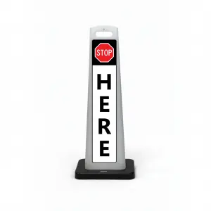 Black white and red stop here flat cone sign with STOP symbol on black header and vertical HERE lettering on white background for Los Angeles valet drop-off ticket booth or security checkpoint