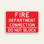 Full red 18x12 horizontal Maxmetal sign with bold white FIRE DEPARTMENT CONNECTION text across three lines in upper zone, white horizontal dividing line, and bold white DO NOT BLOCK text in lower zone, no border.