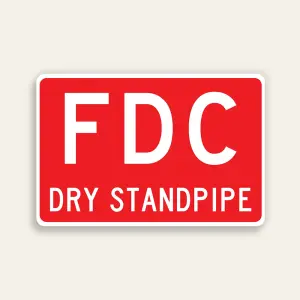 Full red 18x12 horizontal Maxmetal sign with large bold white FDC letters in upper zone and smaller white DRY STANDPIPE text in lower zone on red panel, no border.