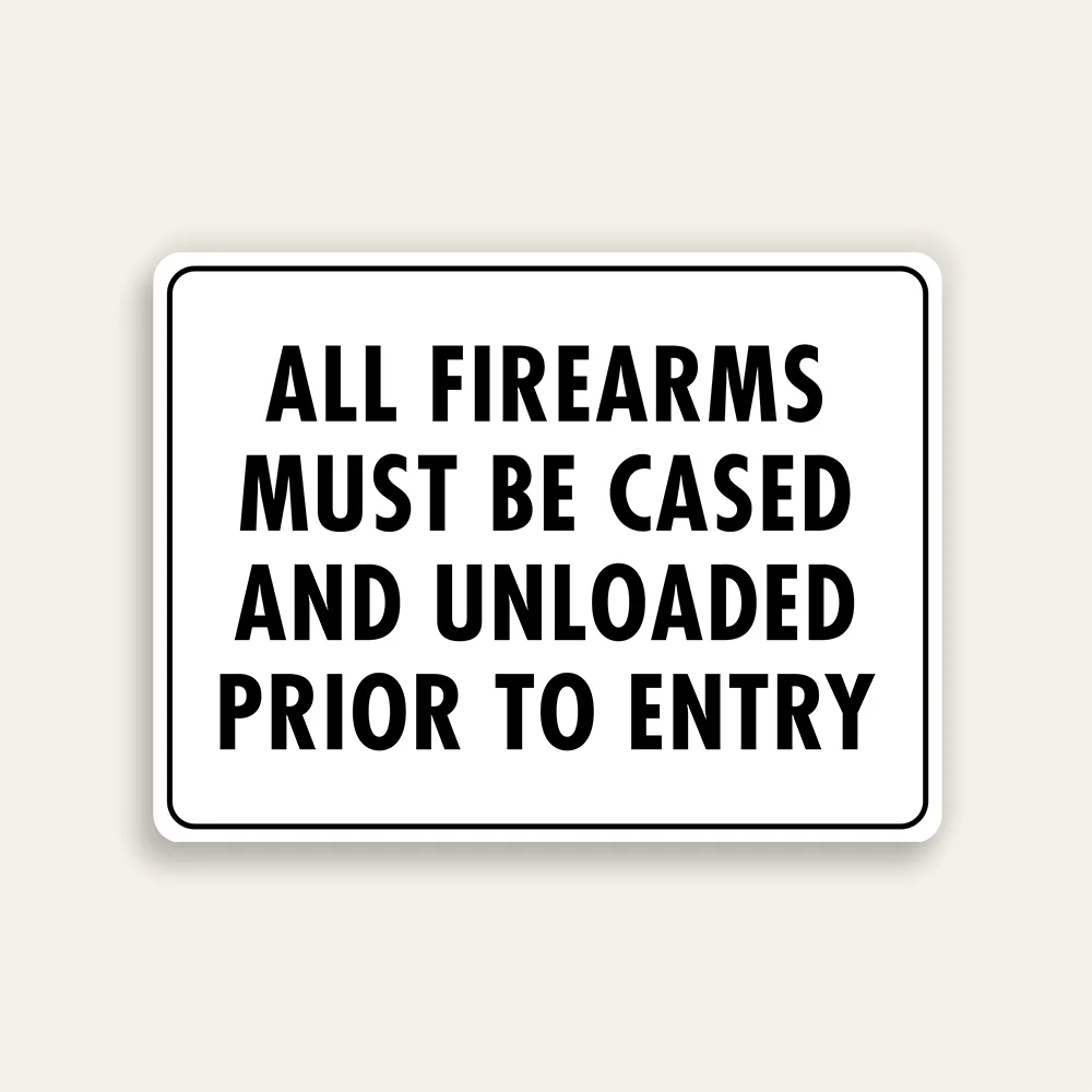 All Firearms Must Be Cased and Unloaded Prior to Entry sign bold black text white background black border horizontal Maxmetal panel Los Angeles