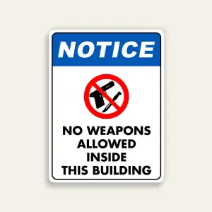 Notice No Weapons Allowed Inside This Building sign blue ANSI header large dual gun knife prohibition symbol bold black text white background vertical Maxmetal panel Los Angeles