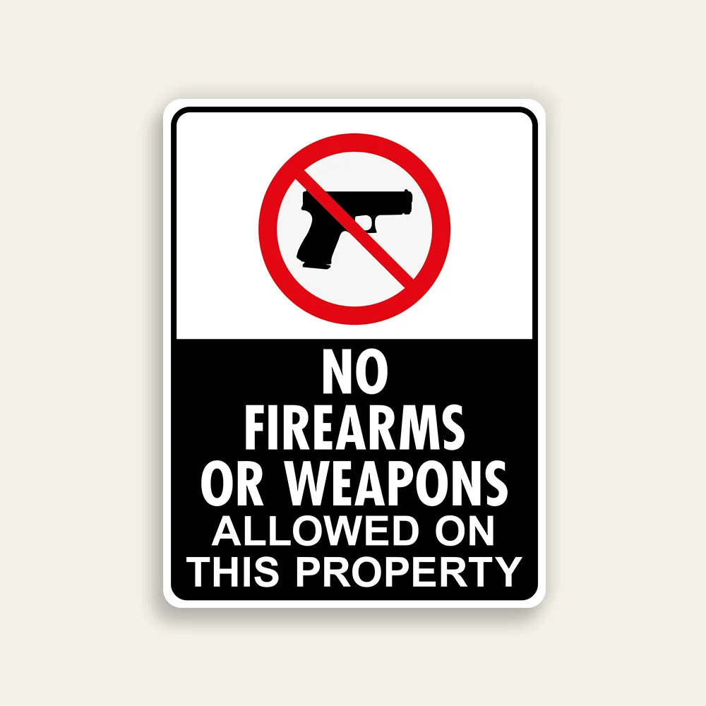 White and black 18x24 vertical Maxmetal sign with large red circle-slash over handgun silhouette in white upper panel and bold white text NO FIREARMS OR WEAPONS ALLOWED ON THIS PROPERTY on solid black lower panel.