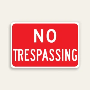 No Trespassing sign bold white text on solid red horizontal Maxmetal panel Los Angeles