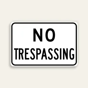 No Trespassing sign bold black text on white horizontal Maxmetal panel Los Angeles