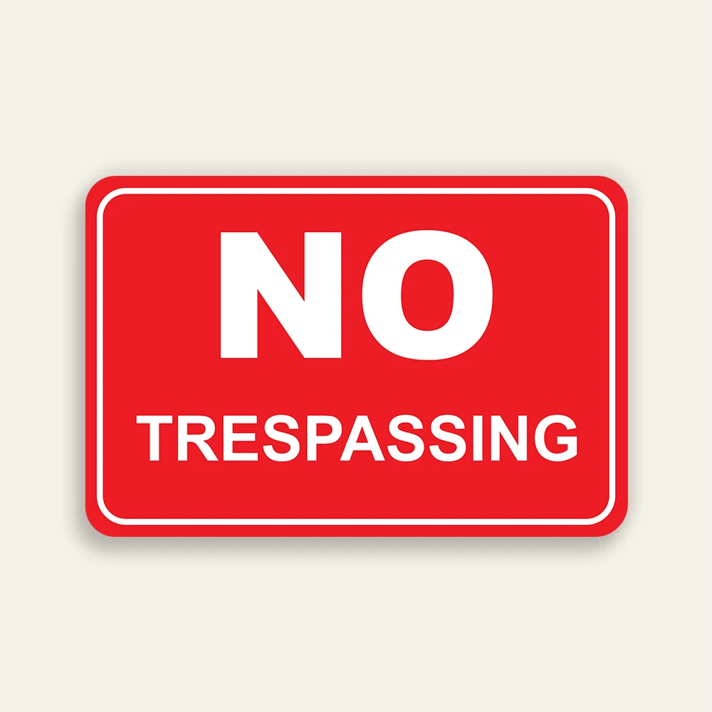 No Trespassing sign bold white text on red with white inner border horizontal Maxmetal panel Los Angeles
