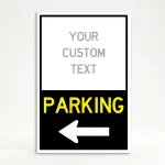 Custom directional parking A-frame sign with white upper branding section and black lower parking direction panel with yellow text and white arrow for Los Angeles venue or business