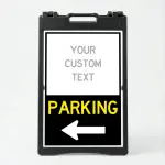 Custom directional parking A-frame sign with white upper branding section and black lower parking direction panel with yellow text and white arrow for Los Angeles venue or business