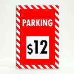 Custom red and white hazard stripe parking rate A-frame sign with large white rate display box showing dollar amount for Los Angeles parking lot or event venue