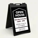 Custom black and white open house date and address A-frame sign with house icon open house text date hours property address and agent contact zone for Los Angeles real estate listing
