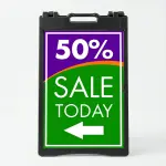 Custom purple and green sale percentage directional A-frame sign with large discount percentage bold sale message and directional arrow for Los Angeles retail store boutique or pop-up vendor