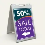 Custom teal and purple sale percentage directional A-frame sign with large discount percentage bold sale message and directional arrow for Los Angeles retail store boutique or pop-up vendor