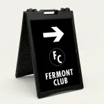 Custom black and white logo directional A-frame sign with large white arrow circular logo zone and company name for Los Angeles business event venue or valet operation
