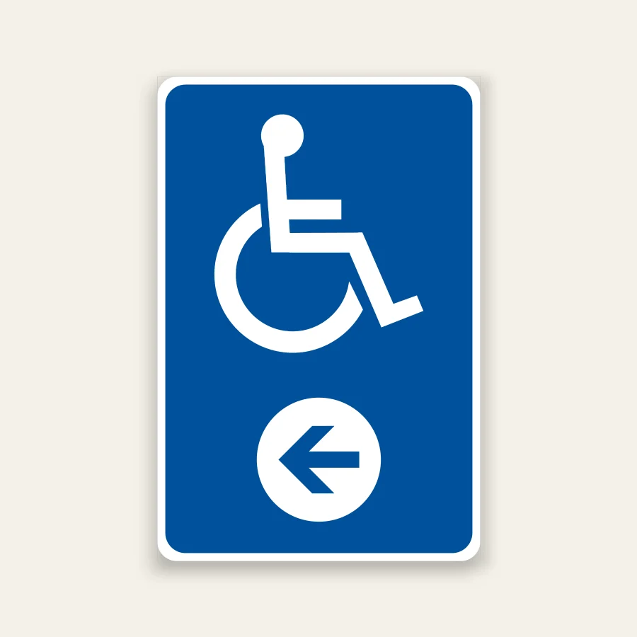 Blue and white Accessible Parking sign with wheelchair symbol and left-pointing directional arrow.