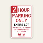 Red and white 2 Hour Parking Only Entire Lot sign with large number 2 on red block, ENTIRE LOT in black text, tow-away warning, C.V.C. 22658A, and tow truck icon.
