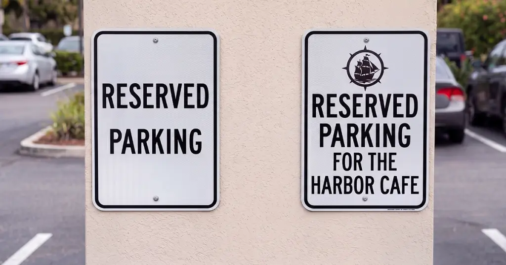Standard versus customizable branded reserved parking sign comparison in Los Angeles