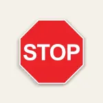 Red octagon stop sign with white border and bold white STOP text centered on the panel.