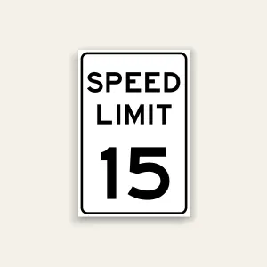 White portrait speed limit sign with rounded black border and black text reading SPEED LIMIT above a large numeral 15.