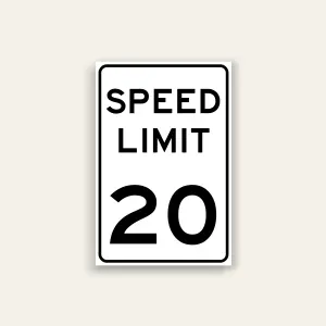 White portrait speed limit sign with rounded black border and black text reading SPEED LIMIT above a large numeral 20.