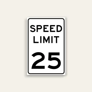 White portrait speed limit sign with rounded black border and black text reading SPEED LIMIT above a large numeral 25.