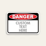 Red, black, and white custom Danger sign with ANSI-standard DANGER oval header and Custom Text Here panel below.